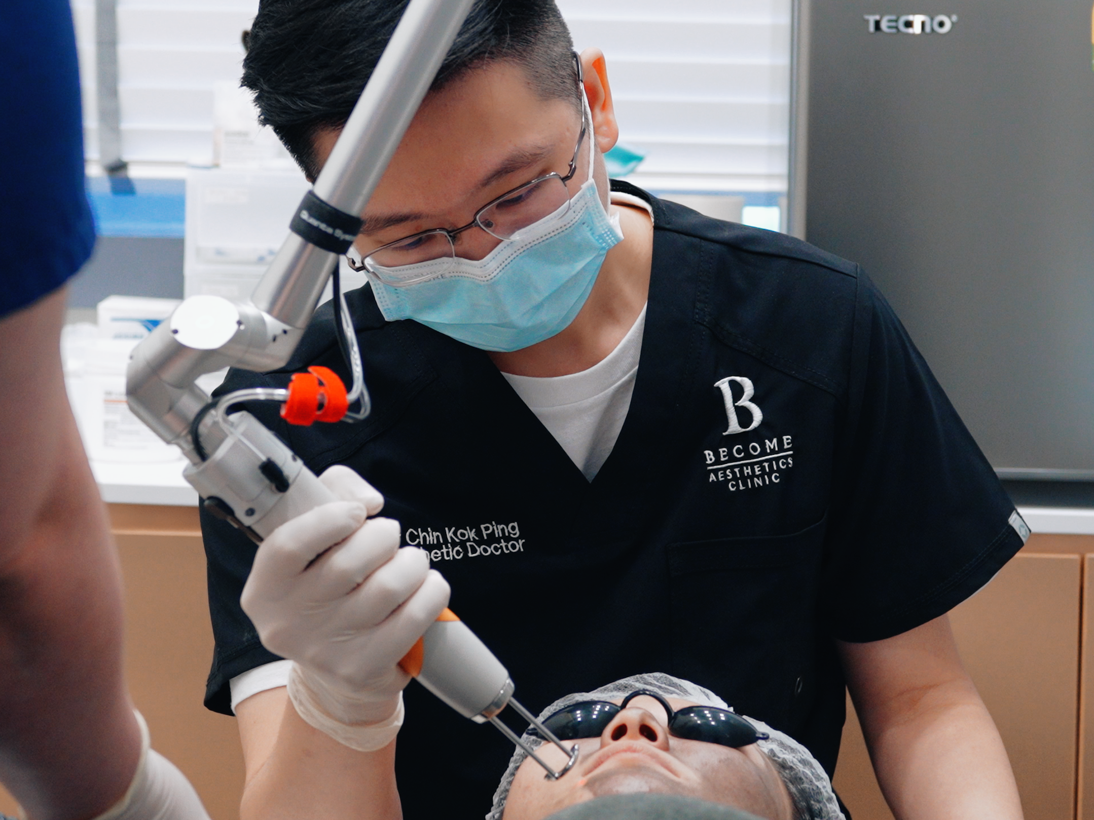 Doctor performing pico laser on patient