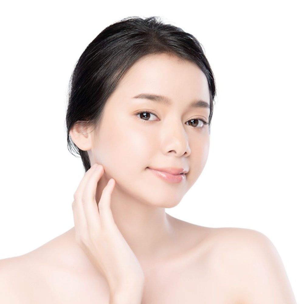 Asian girl emphasising sharp jawline- HIFU treatment