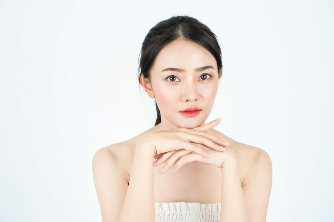asian woman with glowing skin